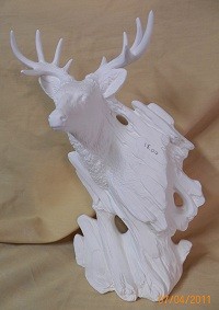 wood carved buck