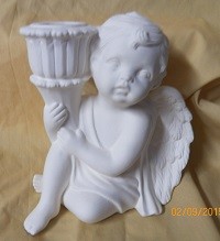 sitting cherub candle holder