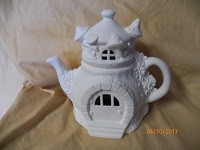 charming rose teapot cottage