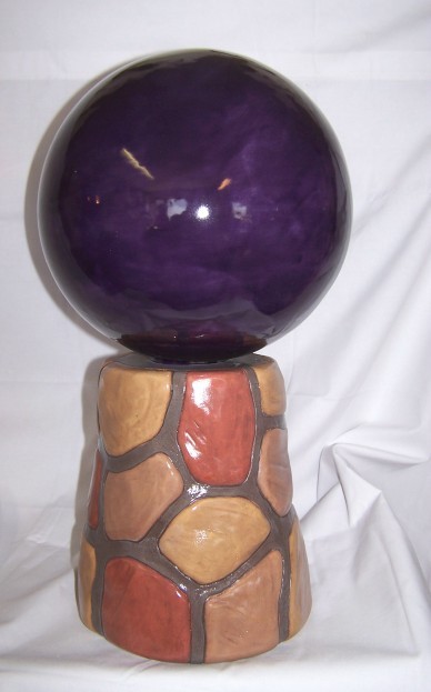 gazing ball on stone base